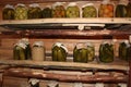 Banks with pickles cucumbers, tomatoes, cabbage in storage