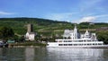 on the banks of the Rhine River and the historic castle, river vessels