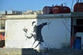 Man throwing flowers by Banksy Royalty Free Stock Photo