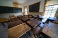 Bannack, Montana - June 29, 2020: Inside the old restored schoolhouse, with desks and a chalkboard in the ghost town at the state