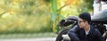 Banner Asian man motorbike in black leather jacket travel rider trip. Panorama Handsome Men wear sunglass outdoor lifestyle Royalty Free Stock Photo