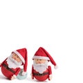 Banner, backdrop or background with two cute Santa Claus Doll on a white background. Suitable for Christmas cards. Isolated Royalty Free Stock Photo