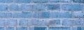 Banner background of an old brick wall, vintage brickwork texture, close-up, blue tinting Royalty Free Stock Photo