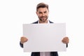 Banner blank board concept. Happy man holds the sign, blank card placard. Sign to your text. Smiling man showing blank Royalty Free Stock Photo