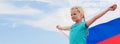 Banner. Blonde girl waving national Russia flag outdoors over blue sky at summer - russian flag, country, patriotism