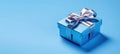 Banner with blue gift box with ribbon and bow for man and boy isolated on blue background.Holiday gift with Birthday or Christmas Royalty Free Stock Photo