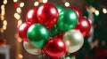 Banner with a bunch of red, green and gold helium balloons on a background of bokeh lights Royalty Free Stock Photo