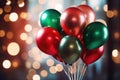 Banner with a bunch of red, green and gold helium balloons on a background of bokeh lights Royalty Free Stock Photo