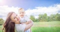 Banner of Caucasians happy baby (boy) and his mother. Healthy child (kid) having fun with mom in the summer. Royalty Free Stock Photo