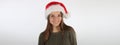 Banner of a Christmas fashion model girl in santa Hat smiling Royalty Free Stock Photo