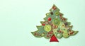 Banner with christmas tree applique with space for text. Christmas tree made of fabric, buttons isolated on green Royalty Free Stock Photo