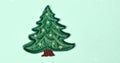 Banner with christmas tree applique with space for text. Christmas tree made of fabric isolated on green background Royalty Free Stock Photo