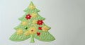 Banner with christmas tree applique with space for text. Christmas tree made of fabric isolated on white background