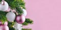 Banner with Christmas tree decorated with white and pink seasonal tree ornament baubles on pink background with copy space Royalty Free Stock Photo