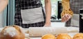 Banner and close up on hands using rolling pin to teach and thresh dough flour to make pie and bread for serving on table in Royalty Free Stock Photo
