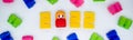 Banner colorful building blocks, toys plastic figure: girl in 2022 numbers on white background Royalty Free Stock Photo