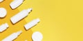Banner with cosmetic on yellow background Royalty Free Stock Photo