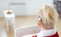 Banner deaf child girl with cochlear implant on living room - deafness diversity and innovative hearing aid medical Royalty Free Stock Photo