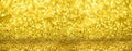 Banner with defocused lights, bright yellow bokeh. Golden shiny background, copy space for your Christmas greetings. Shimmer of Royalty Free Stock Photo