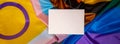 Banner Empty paper blank on Rainbow LGBTQIA flag made from silk material. Mock up template copy space for your text