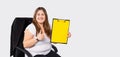 Banner, long format. Fat obese woman gesturing thumb up, holding empty clipboard with illuminating color, blank sheet