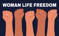Banner with female hands clenched into a fist and the slogan - Woman, life, freedom. Royalty Free Stock Photo