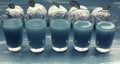 Banner Five Glasses Blue Drink surrealism Apple Foil Blue Shabby background.