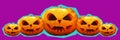 Banner five halloween pumpkins of different sizes with carved scary mugs collage on a purple background. Royalty Free Stock Photo