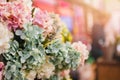 Banner florist shop, closeup luxurious flowers bouquet, in background fridge storage