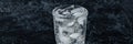 banner with glass with ice water and ice cubes on a black textured background. A refreshing and chilling drink in hot Royalty Free Stock Photo