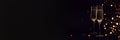 Banner with glasses of champagne on black background Royalty Free Stock Photo