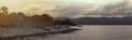 Banner Gloomy seascape line horizon Sea Lighthouse. Royalty Free Stock Photo