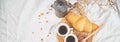 Banner of Good morning. Two cup of coffee with croissant and jam Royalty Free Stock Photo