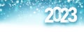 Banner with hanging 2023 sign on blue snowing background