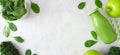 Banner with healthy green smoothie double border over a white marble background with copy space Royalty Free Stock Photo