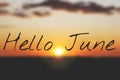 Banner hello june. Text on the photo. Text hello June. New month. New season. Summer month. Text on sunset photo Royalty Free Stock Photo