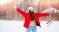 Banner Ice city rink winter sunset, Happy smile woman roller in red jacket and white hat skating Royalty Free Stock Photo