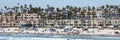 Banner image of beach, buildings and people at Oceanside, California