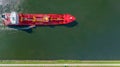 Banner of industrial fuel and petrochemical tanker being led by the pilot boat. Piloting service. Unknown waters. Banner top view