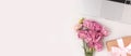 Banner with laptop, bouquet of eustoma flowers and gift box with tied bow
