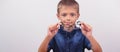 Banner little boy with glasses correcting myopia close-up portrait Ophthalmology problem selective focus