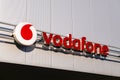 Banner and logo of a telecommunication company Vodafone on a grey mall in Havirov