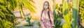 BANNER, LONG FORMAT beautiful stylish young woman in pink dress in desert among the cacti, wearing a medical mask during Royalty Free Stock Photo