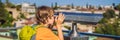BANNER, LONG FORMAT Boy tourist looks through binoculars in Old town Kaleici in Antalya. Turkiye. Panoramic view of Royalty Free Stock Photo