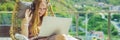 BANNER, LONG FORMAT Caucasian woman sitting on the terrace working from home using computer laptop. Young woman teaches Royalty Free Stock Photo