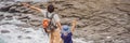 BANNER, LONG FORMAT Dad and son tourists on the background of beautiful rocks and the sea. Hiking concept. Tobizin cape