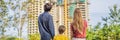 BANNER, LONG FORMAT Family mother, father and son looking at their new house under construction, planning future and Royalty Free Stock Photo