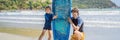 BANNER, LONG FORMAT Father or instructor teaching his son how to surf in the sea on vacation or holiday. Travel and