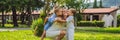 BANNER, LONG FORMAT Happy family outdoors on the grass in a park, smiling faces, having fun Portrait of a disgruntled Royalty Free Stock Photo