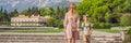 BANNER, LONG FORMAT Mom and son tourists walking together in Montenegro. Panoramic summer landscape of the beautiful Royalty Free Stock Photo